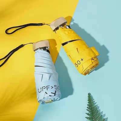 87cm offener Durchmesser UV-Schutz Mini-Größe Regenschirm mit goldenen Metall-Glasfaserribben