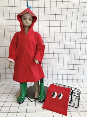 Durchsichtiger langer Regenmantel für kleine Dinosaurierkinder im Kindergarten und in der 1. bis 3. Klasse