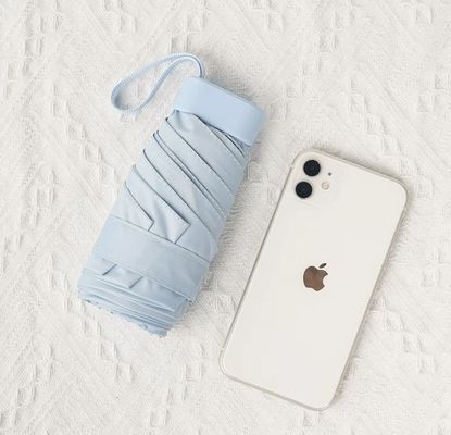 X503 Karton-Tasche Sonnenschirm UV-Schutz und kleine Tasche für einfaches Tragen an sonnigen Tagen