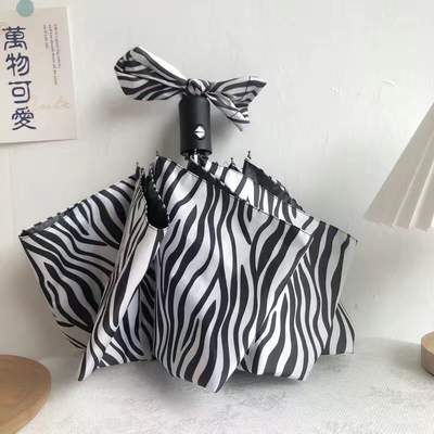 Klopfen warme gelbe Zebra Regenschirm Frauen Sonne und Regen doppelte Sonnenschutzmittel Vinyl tägliche Produkte
